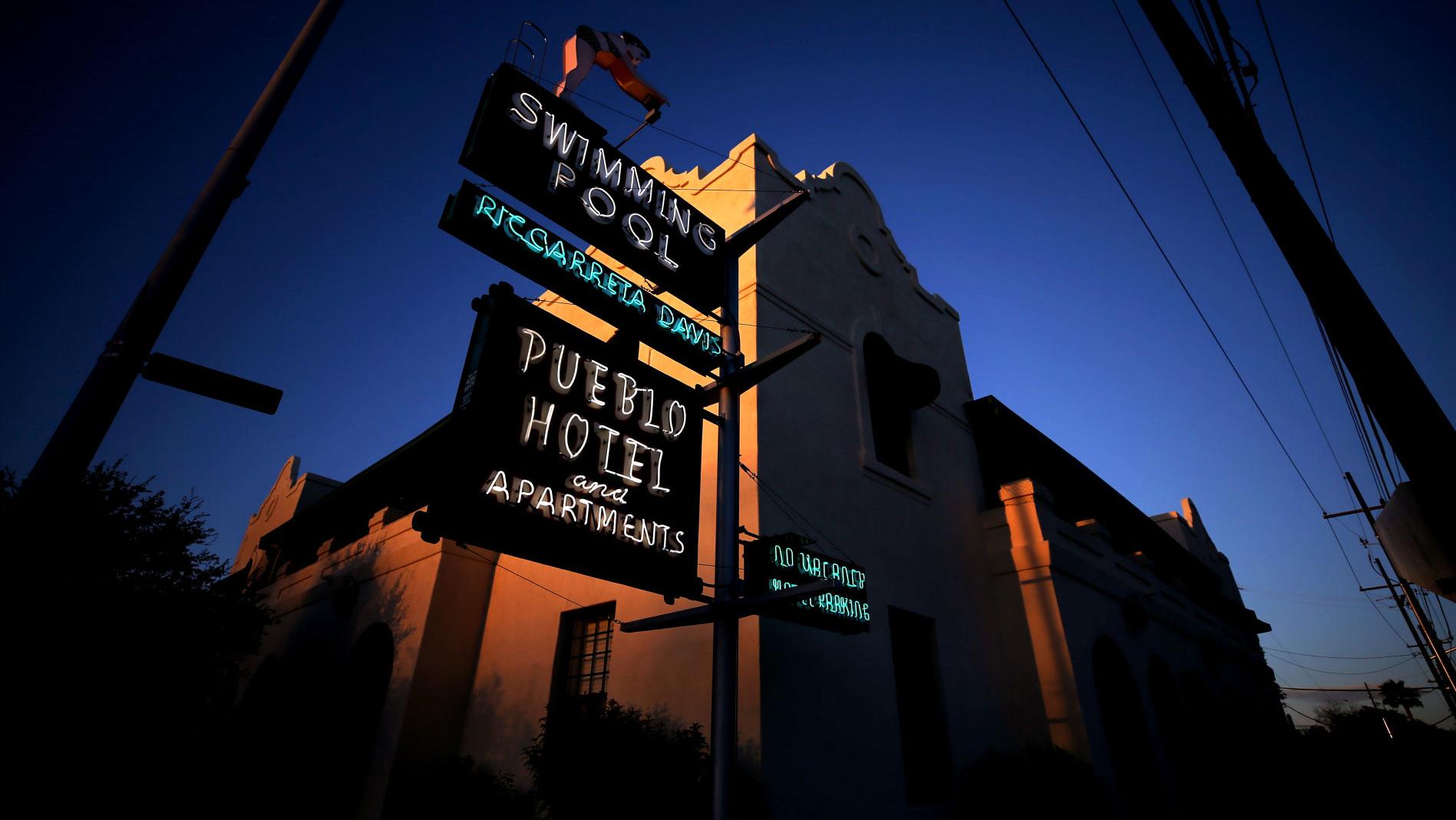 Downtown's 'diving girl' sign expected to stay